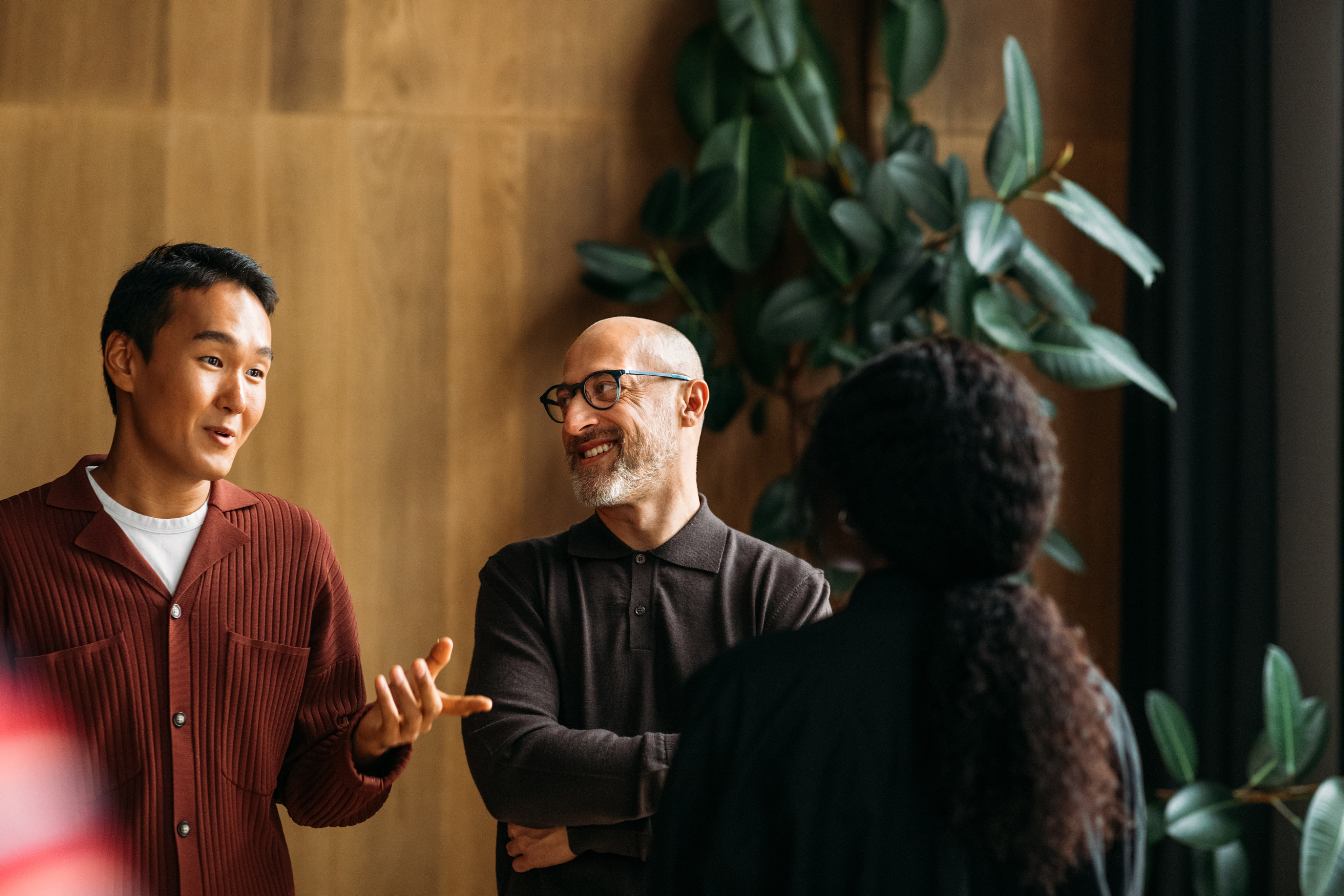 Man listening to another man speak